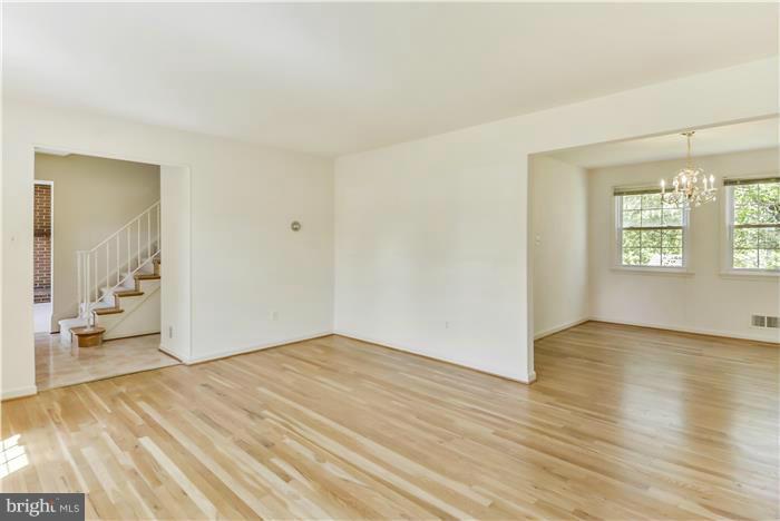 15507 Good Hope Road Silver Spring, MD 20905 - Photo 8 of 30 an empty room with wooden floor and windows