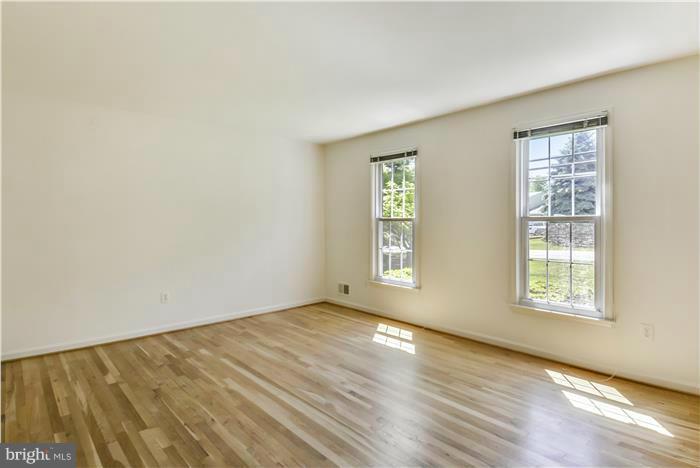 15507 Good Hope Road Silver Spring, MD 20905 - Photo 9 of 30 an empty room with wooden floor and windows