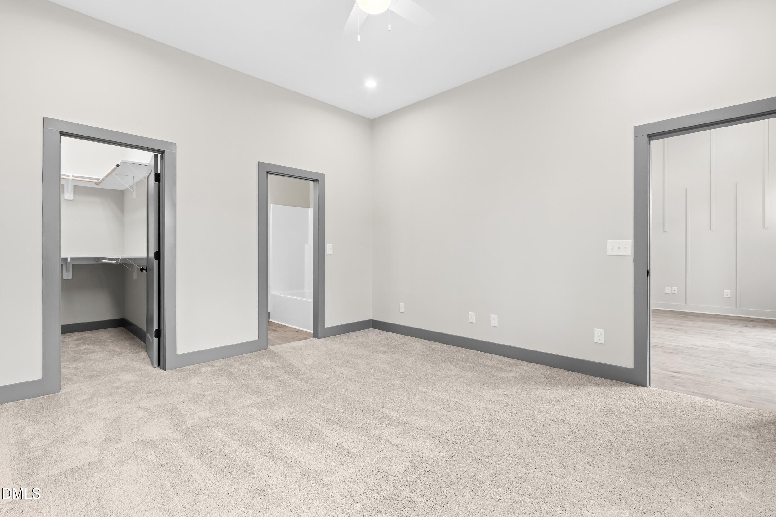 6731 Knightdale-Eagle Rock Road Wendell, NC 27591 - Photo 15 of 25 an empty room with closet and a bathroom