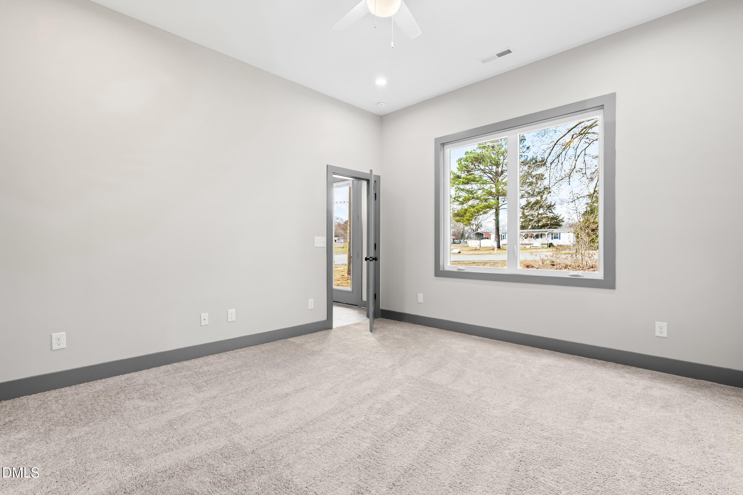 6731 Knightdale-Eagle Rock Road Wendell, NC 27591 - Photo 16 of 25 an empty room with windows