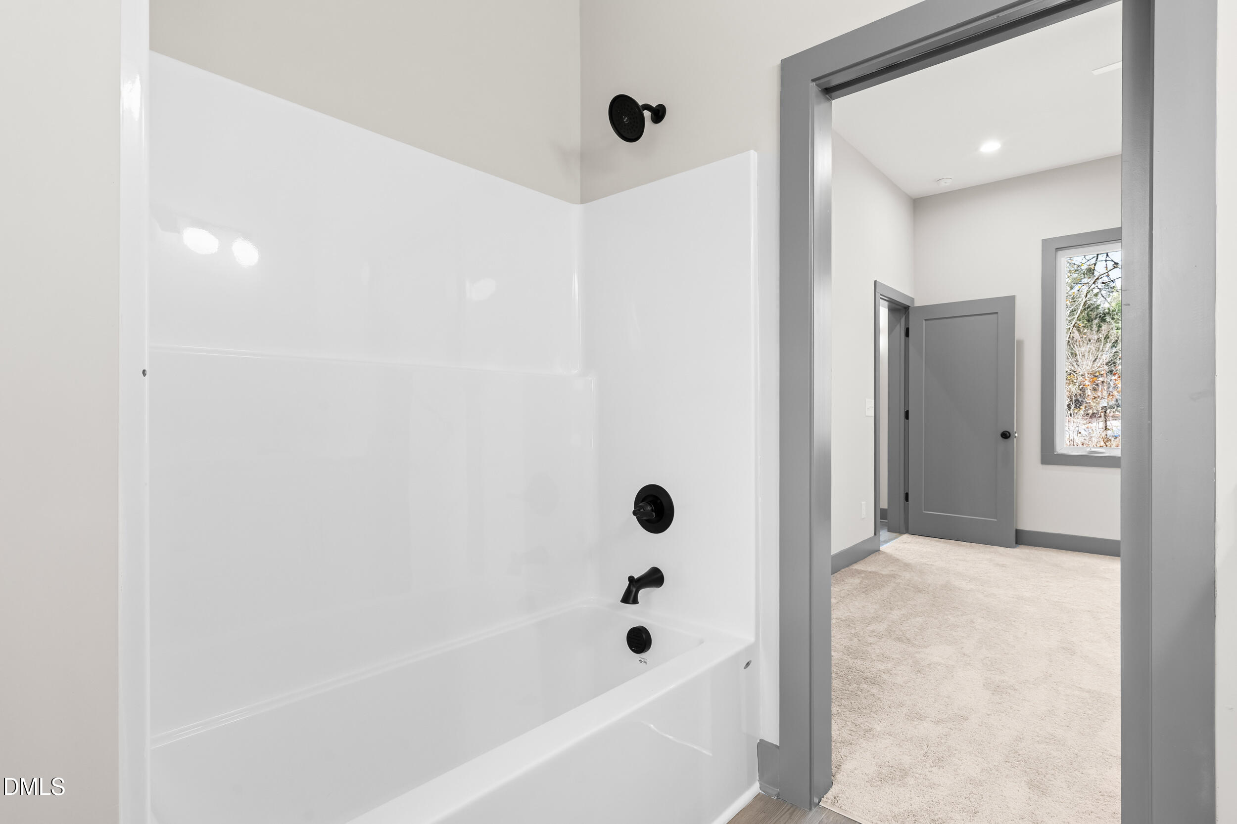 6731 Knightdale-Eagle Rock Road Wendell, NC 27591 - Photo 21 of 25 a bathroom with a bathtub