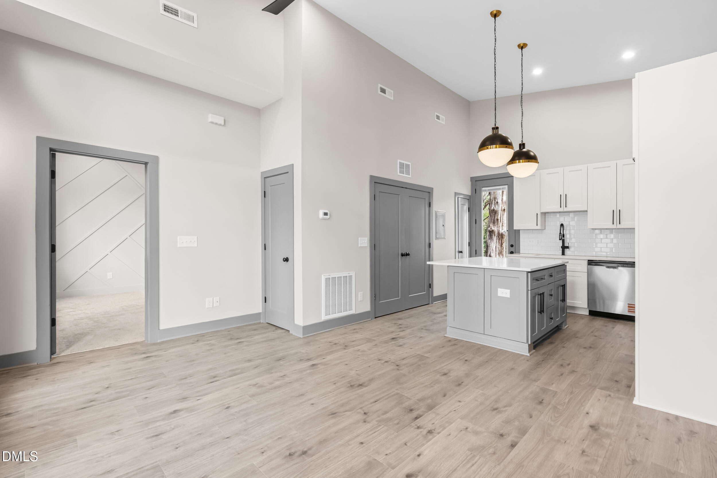 6731 Knightdale-Eagle Rock Road Wendell, NC 27591 - Photo 4 of 25 a large room with a lot of cabinets