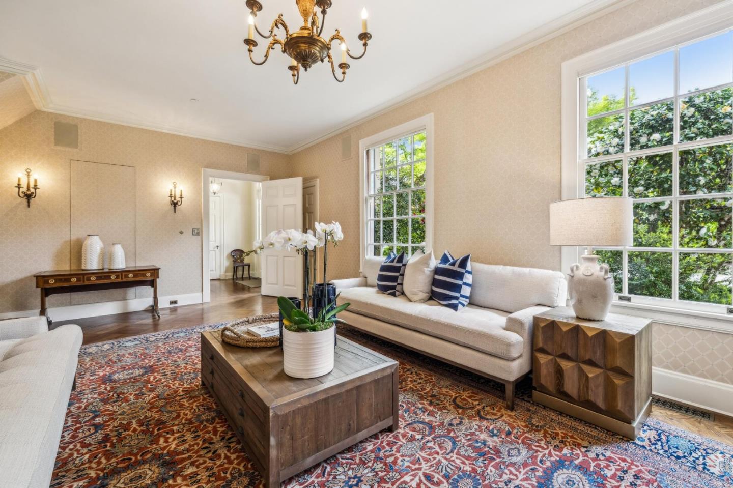 100 Cañada Road Woodside, CA 94062 - Photo 12 of 79 a living room with furniture and a large window