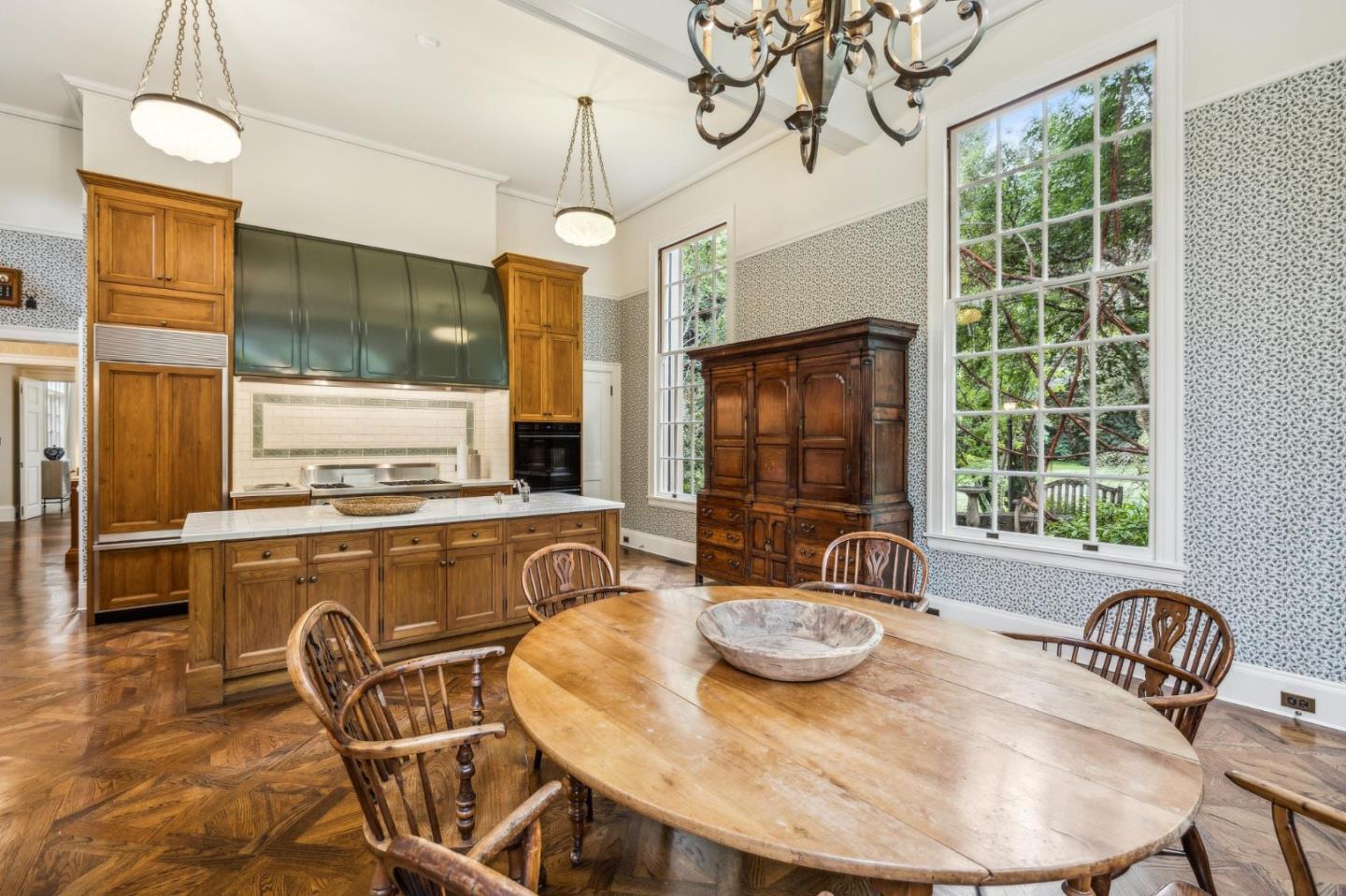 100 Cañada Road Woodside, CA 94062 - Photo 23 of 79 a view of a dining room with furniture window and outside view