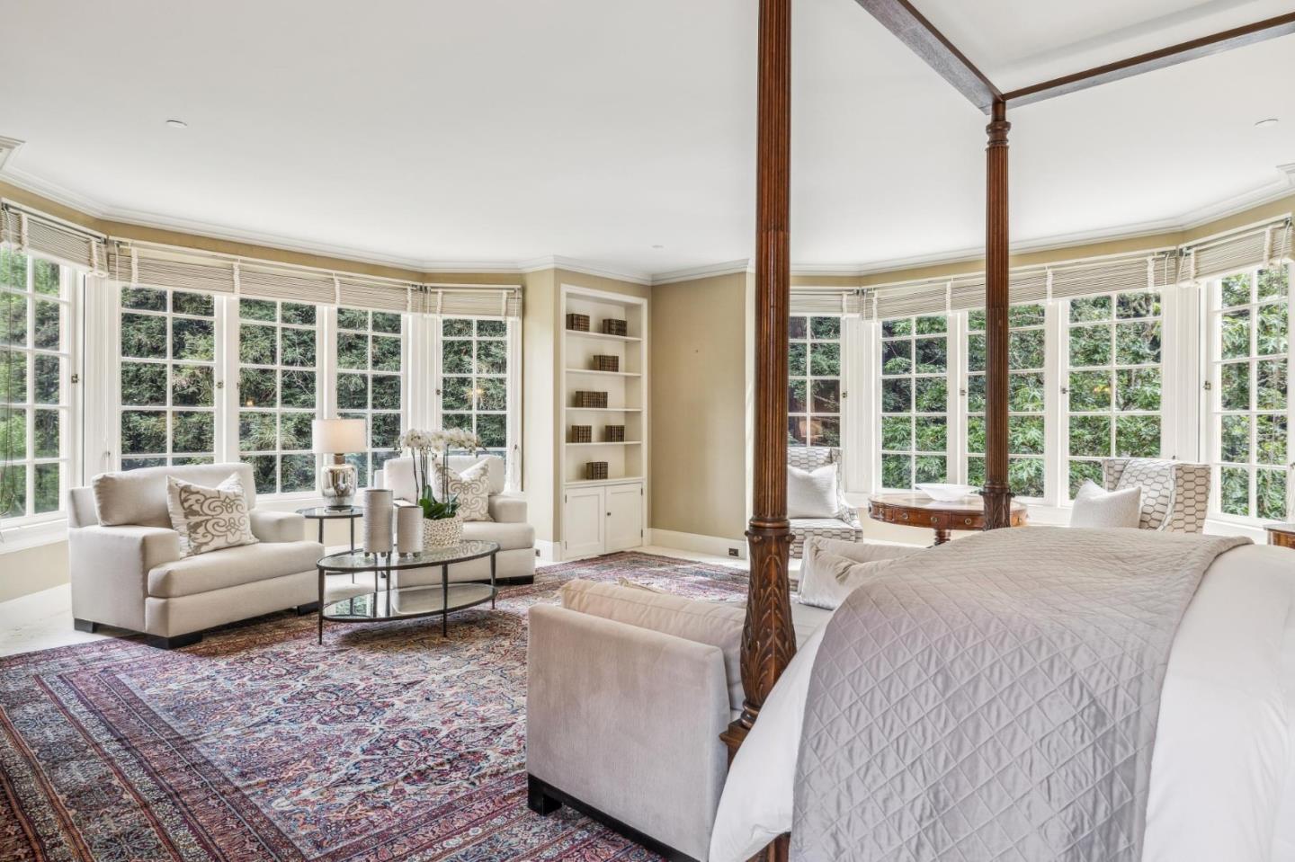 100 Cañada Road Woodside, CA 94062 - Photo 31 of 79 a living room with furniture and large windows