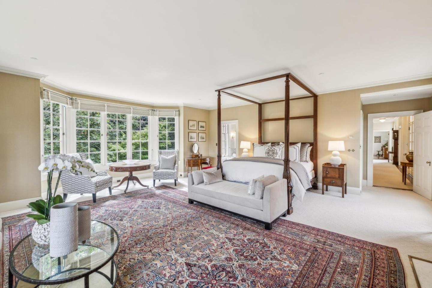 100 Cañada Road Woodside, CA 94062 - Photo 32 of 79 a living room with furniture large windows and wooden floor