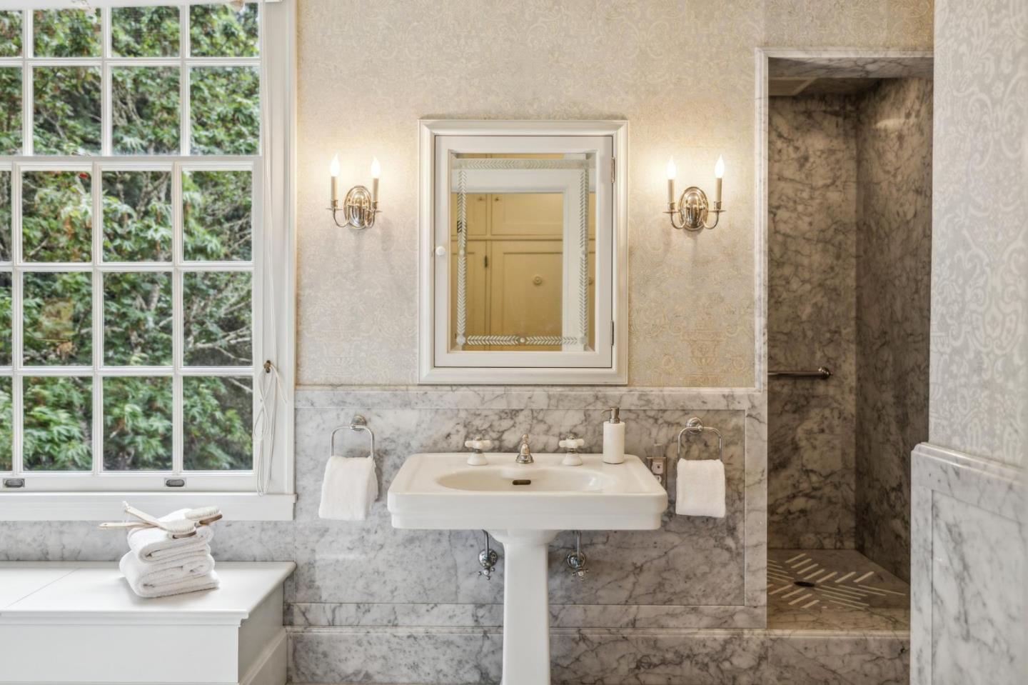 100 Cañada Road Woodside, CA 94062 - Photo 33 of 79 a bathroom with a sink and a mirror