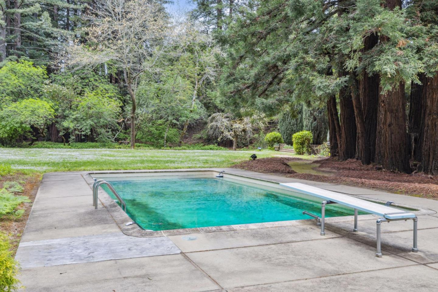 100 Cañada Road Woodside, CA 94062 - Photo 47 of 79 a view of a park with large trees