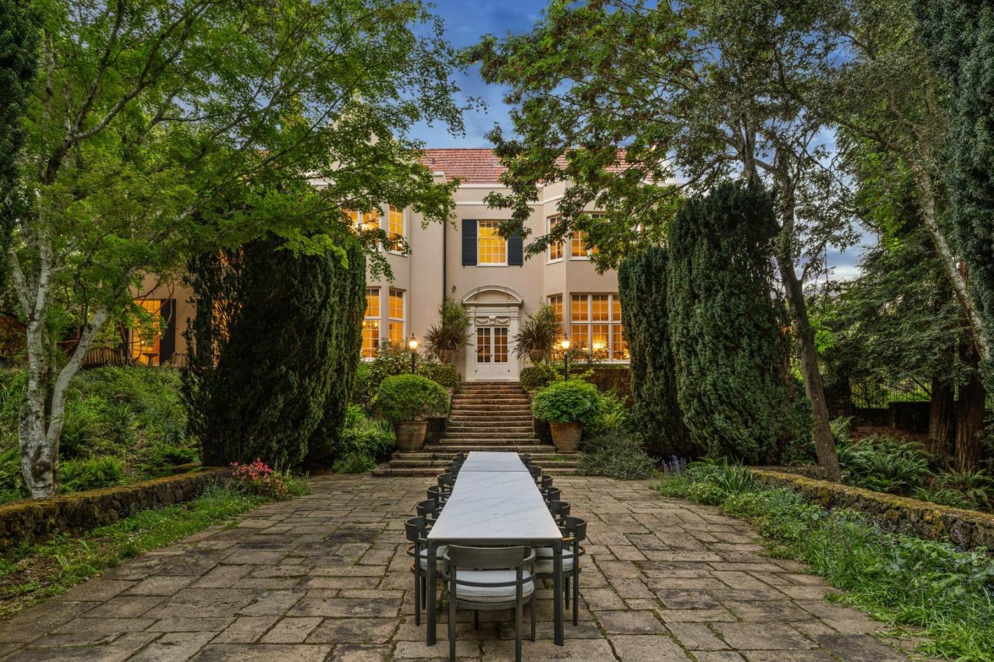 100 Cañada Road Woodside, CA 94062 - Photo 68 of 79 a front view of a house with a garden
