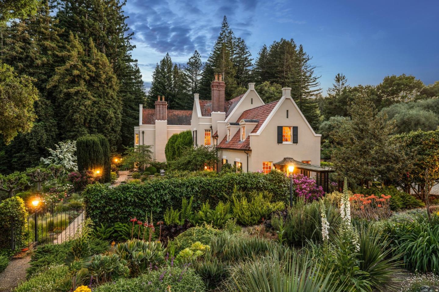 100 Cañada Road Woodside, CA 94062 - Photo 75 of 79 a view of a house with a yard and trees