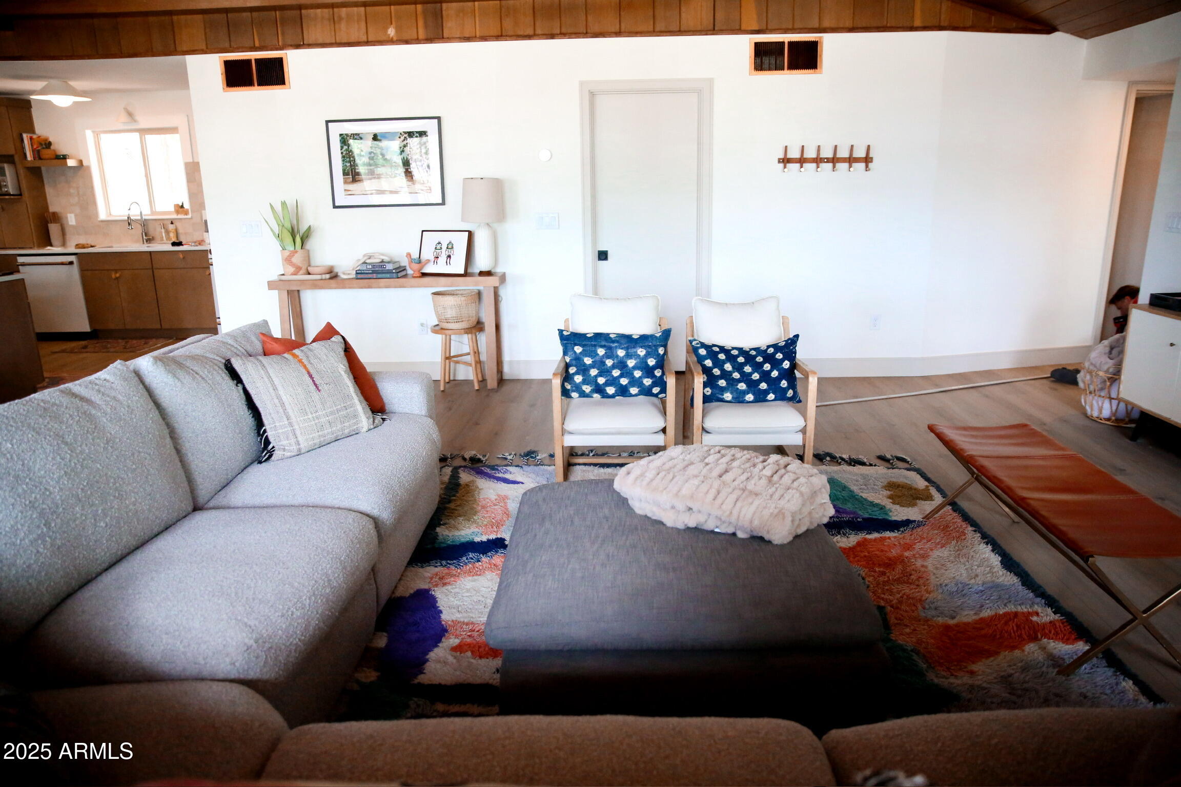 480 Cochise Road Munds Park, AZ 86017 - Photo 11 of 62 a living room with furniture and wooden floor