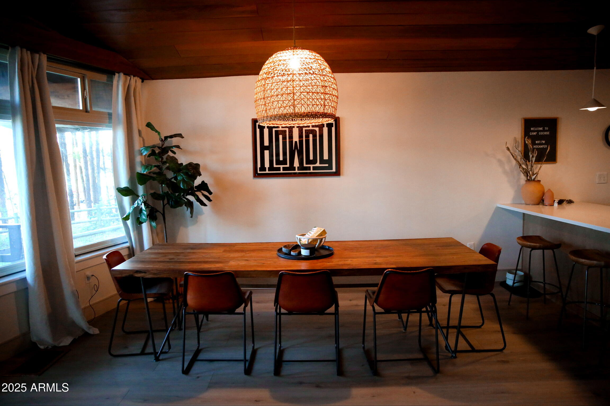 480 Cochise Road Munds Park, AZ 86017 - Photo 15 of 62 a view of a dining room with furniture and window