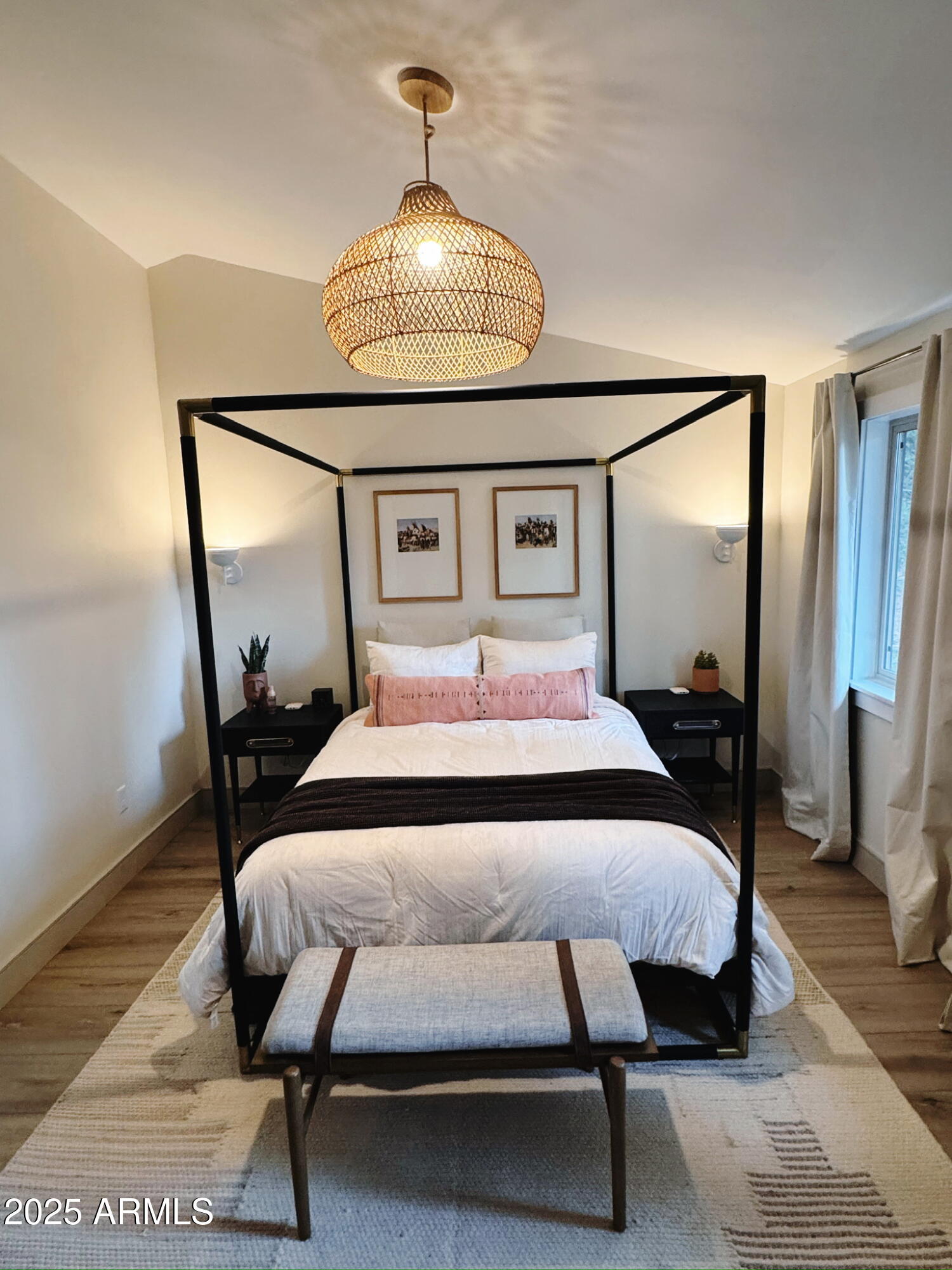 480 Cochise Road Munds Park, AZ 86017 - Photo 29 of 62 a bedroom with a bed and wooden floor