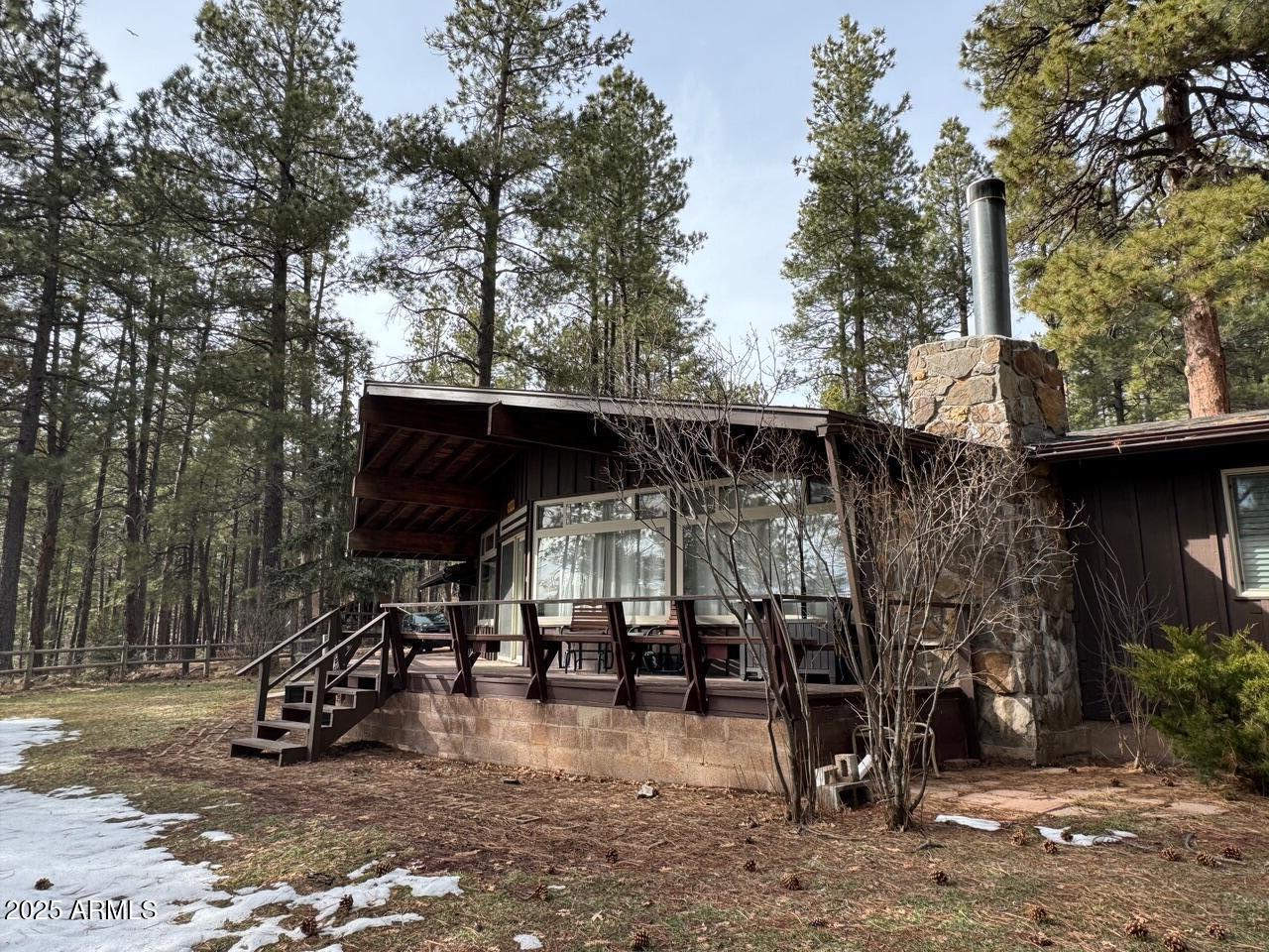 480 Cochise Road Munds Park, AZ 86017 - Photo 3 of 62 a view of outdoor space and deck