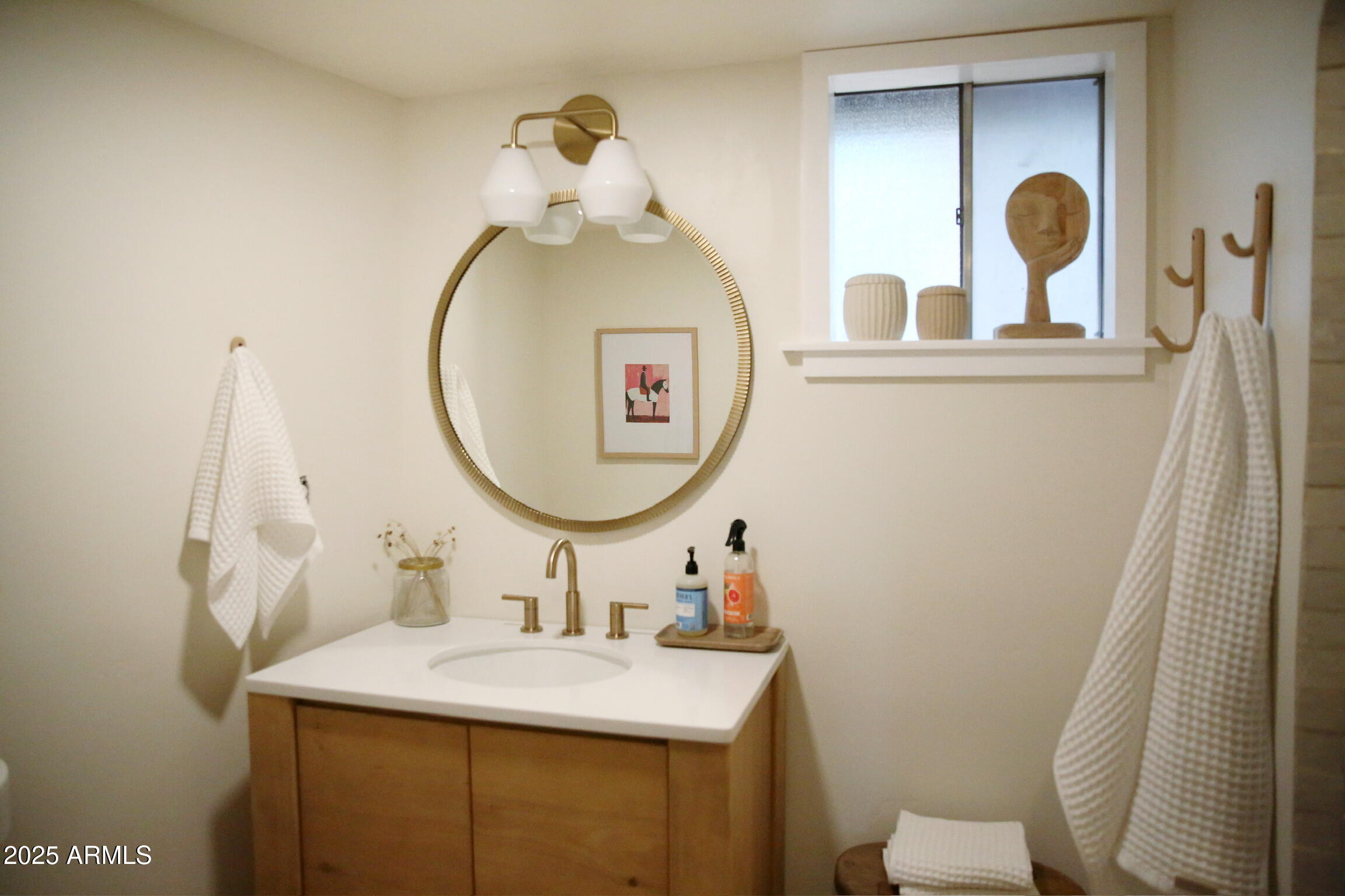 480 Cochise Road Munds Park, AZ 86017 - Photo 39 of 62 a bathroom with a sink mirror vanity and toilet