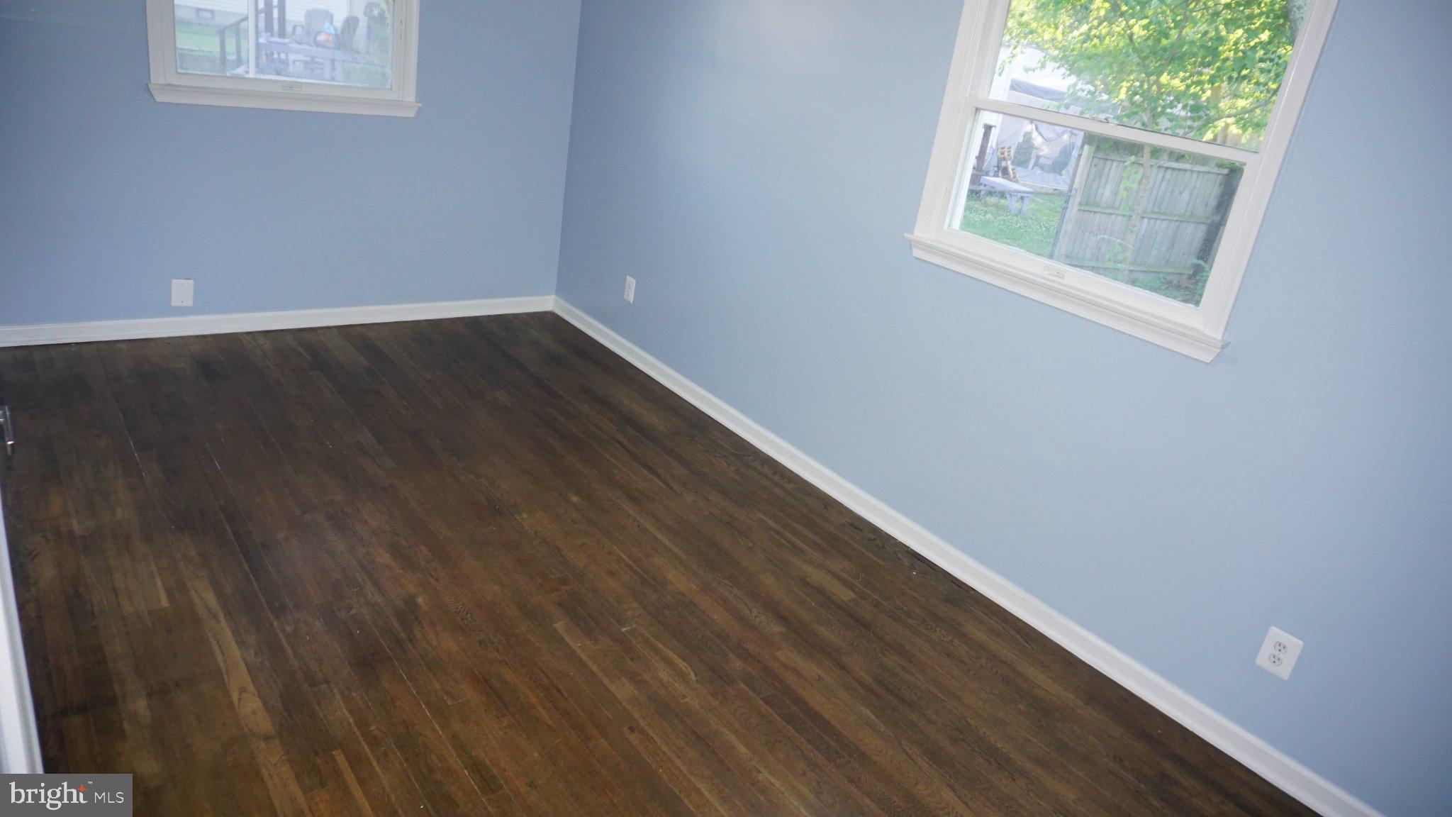 5854 Deale Churchton Road Deale, MD 20751 - Photo 38 of 57 Bright and airy room with hardwood floors.