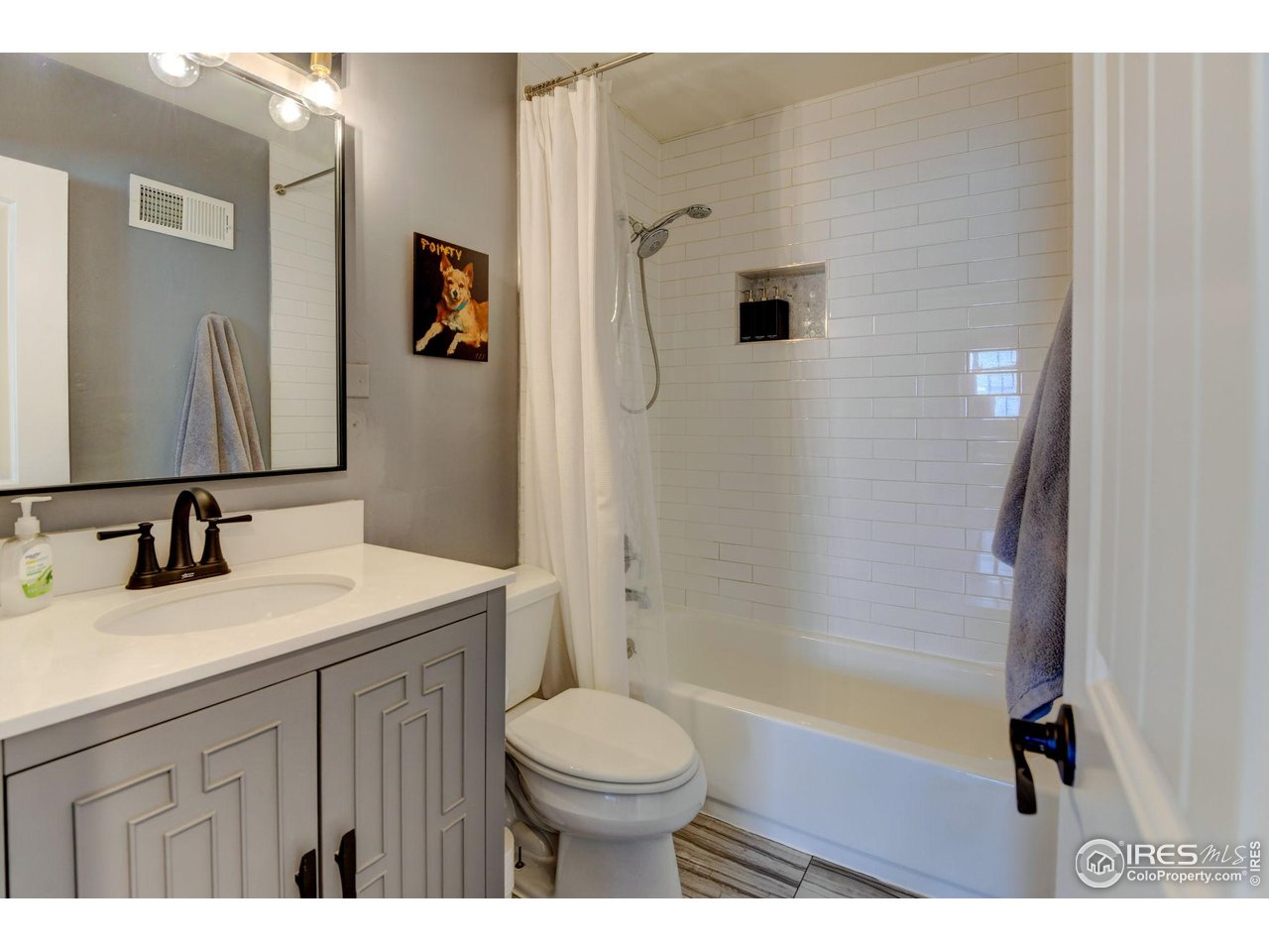 1150 Eudora Street Denver, CO 80220 - Photo 30 of 39 a bathroom with a granite countertop sink toilet and shower