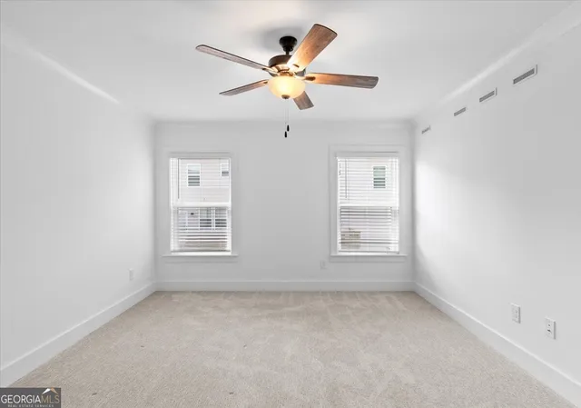 a bathroom with a sink a mirror and a toilet