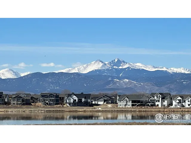 a view of a lake with a city