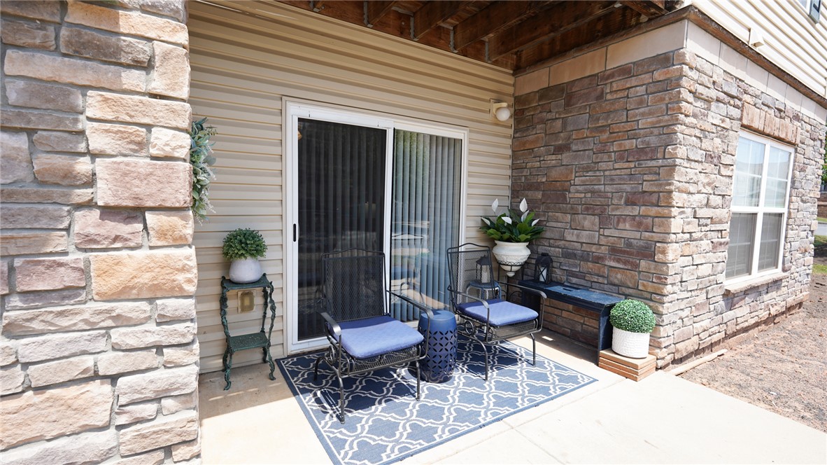 303 Lookover Drive Anderson, SC 29621 - Photo 3 of 46 This cozy patio provides an inviting outdoor retreat, perfect for relaxation.