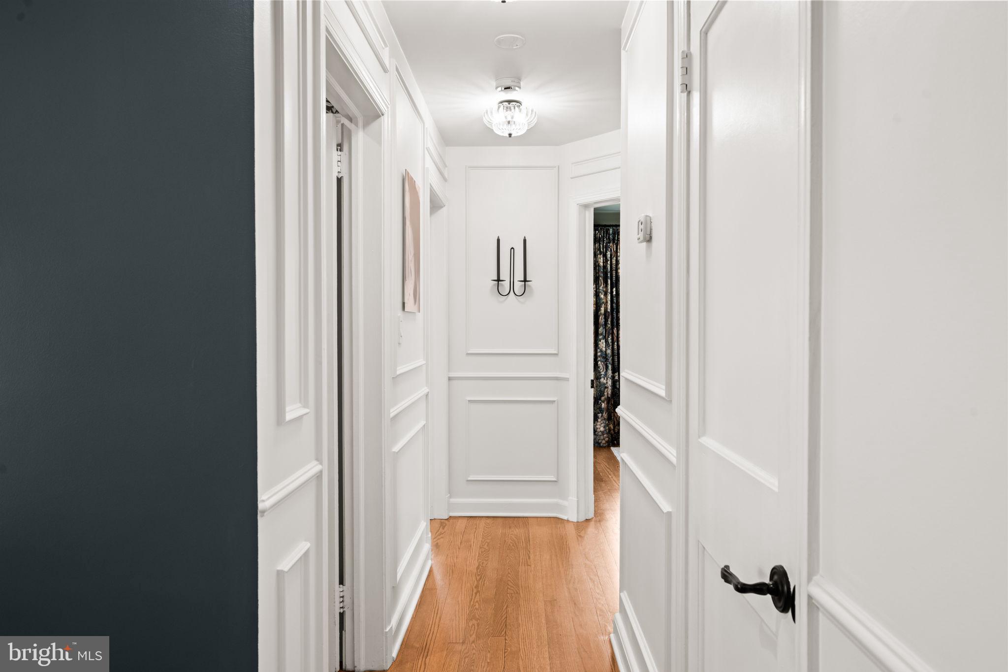 3814 Hillcrest Lane Annandale, VA 22003 - Photo 19 of 48 a view of a hallway with wooden floor and staircase