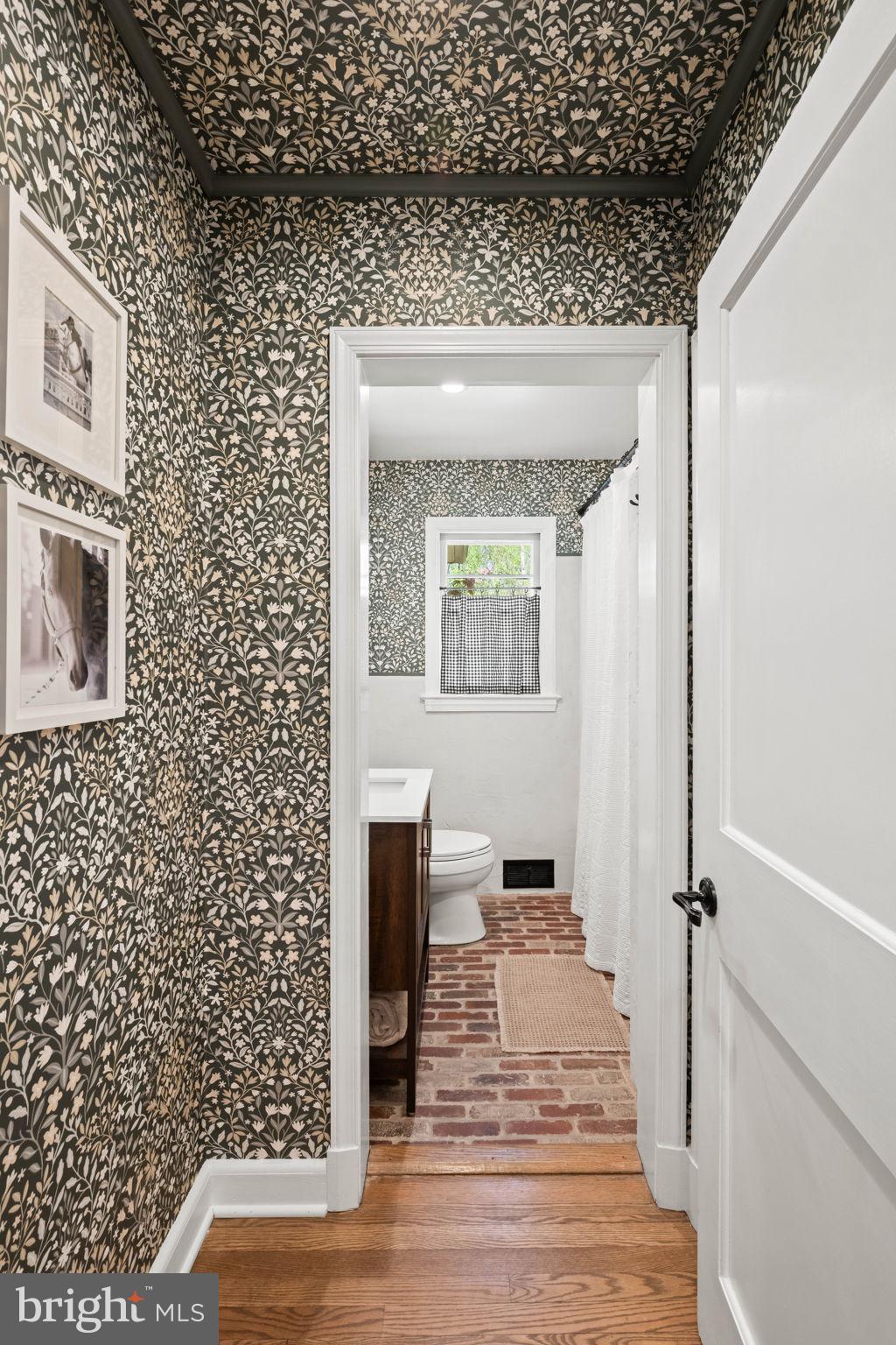 3814 Hillcrest Lane Annandale, VA 22003 - Photo 20 of 48 a view of a hallway with wooden floor and staircase