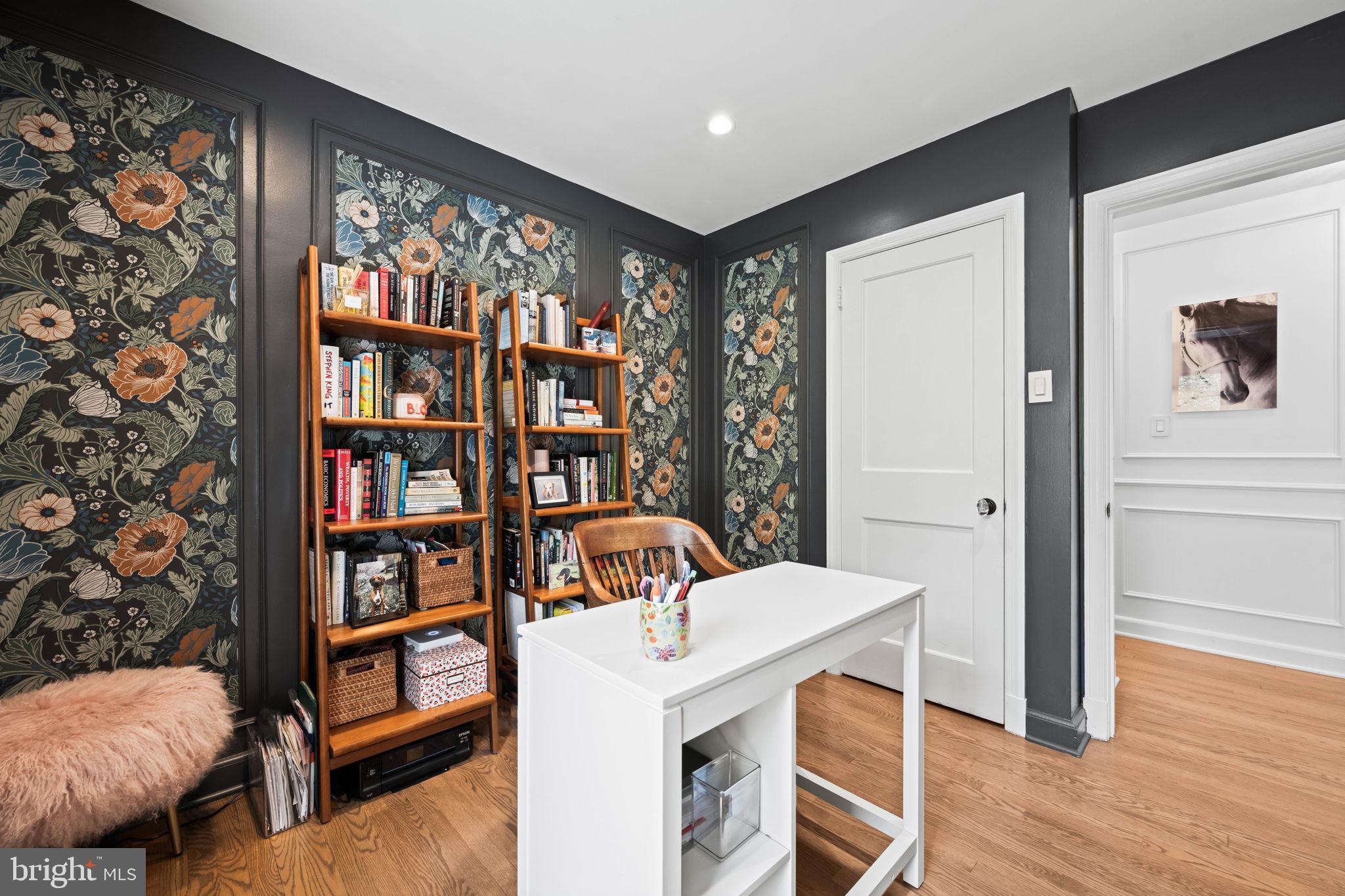 3814 Hillcrest Lane Annandale, VA 22003 - Photo 23 of 48 a living room with furniture and a book shelf