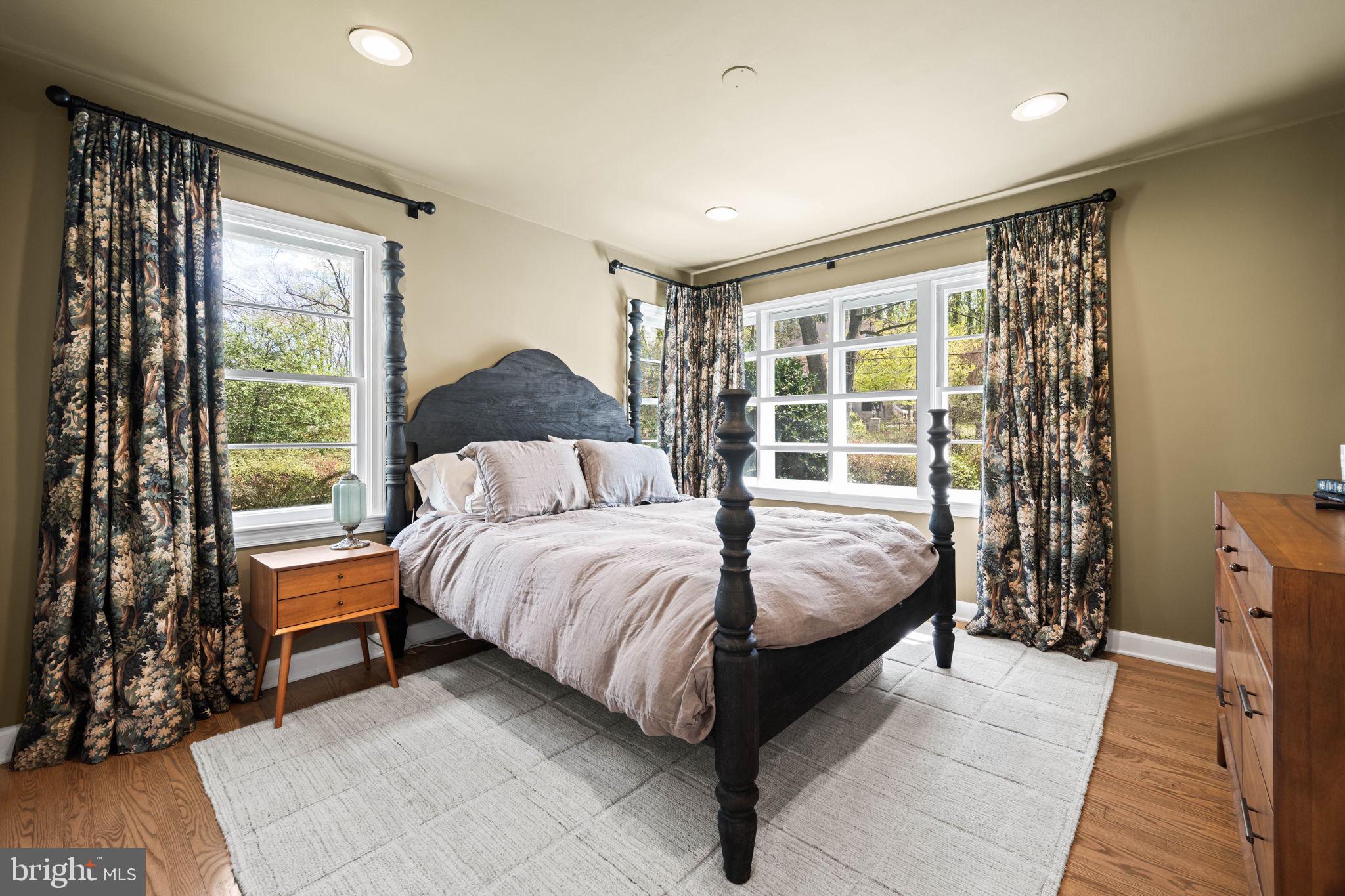 3814 Hillcrest Lane Annandale, VA 22003 - Photo 24 of 48 a bedroom with a large bed and a large window