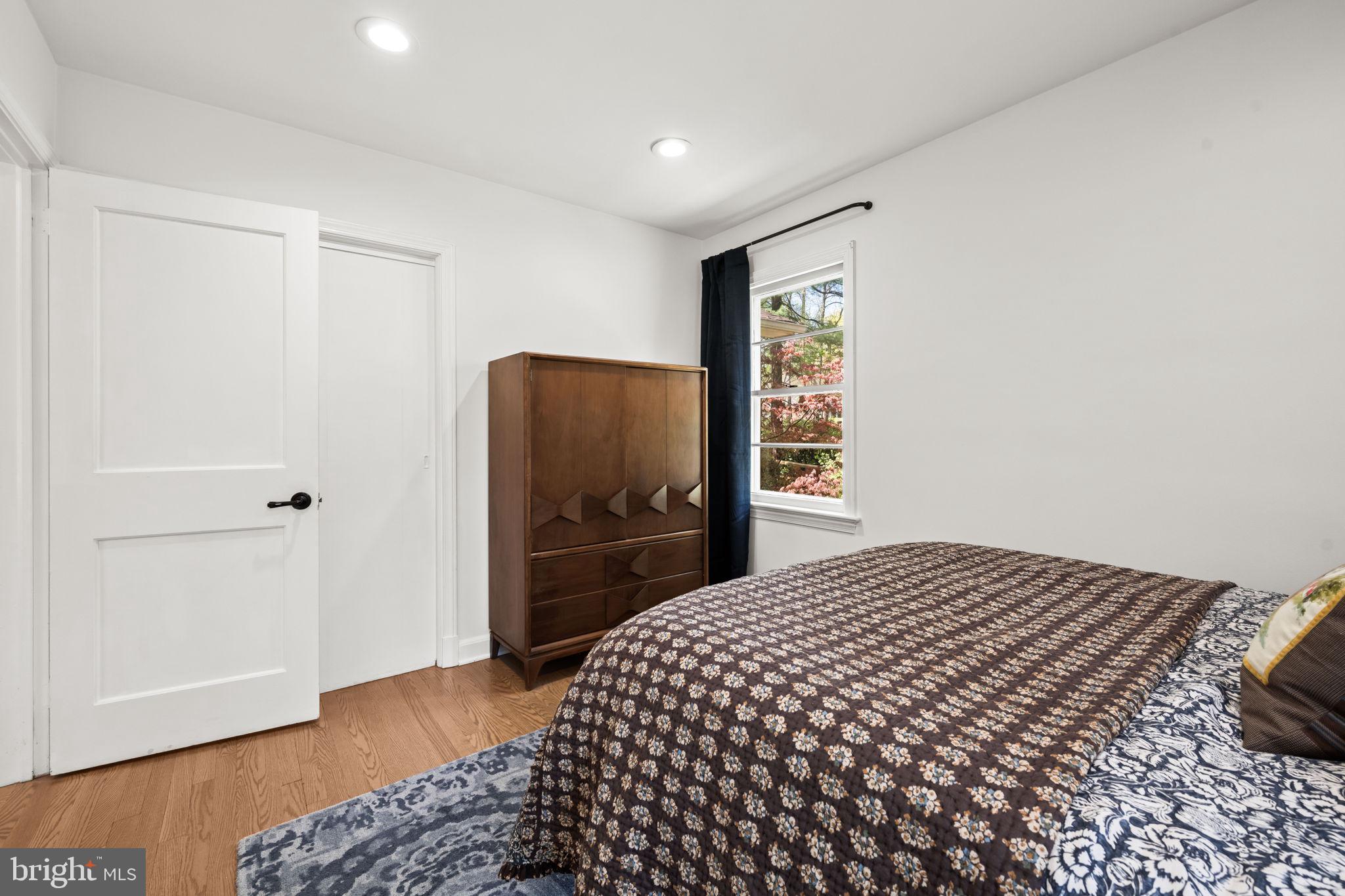 3814 Hillcrest Lane Annandale, VA 22003 - Photo 28 of 48 a bedroom with a bed and a dresser
