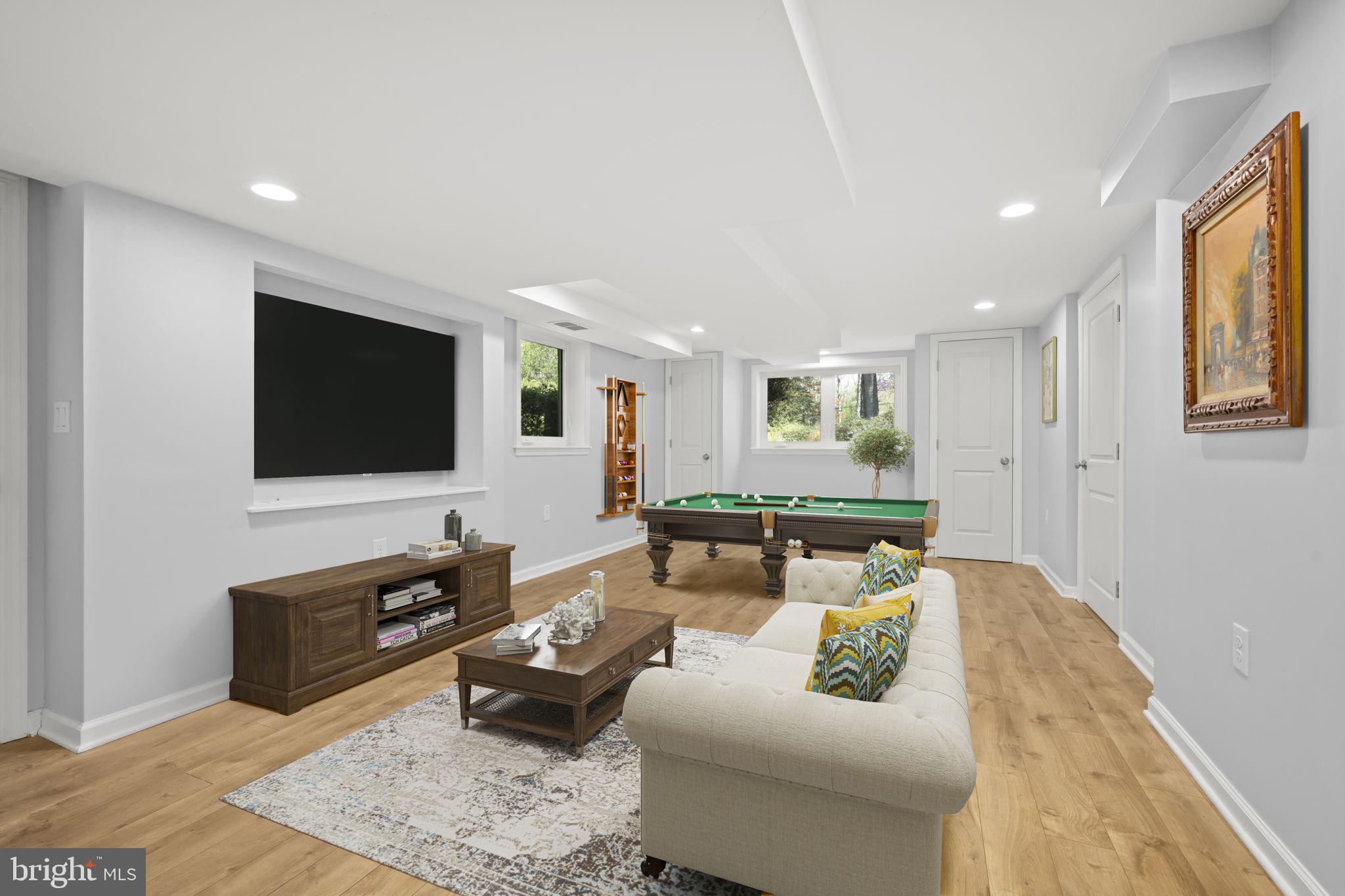 3814 Hillcrest Lane Annandale, VA 22003 - Photo 30 of 48 a living room with furniture and a flat screen tv