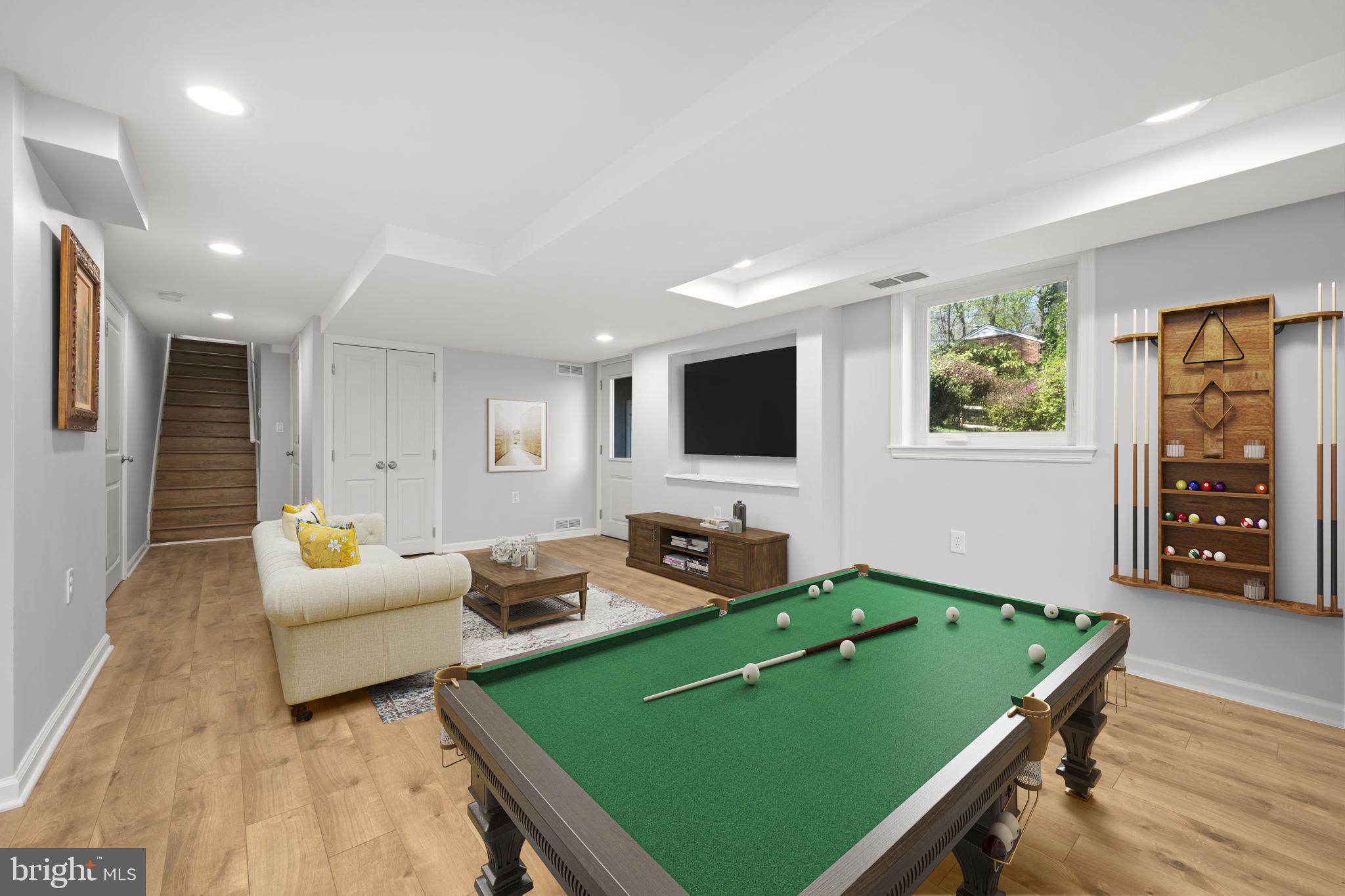 3814 Hillcrest Lane Annandale, VA 22003 - Photo 32 of 48 a living room with furniture and a flat screen tv