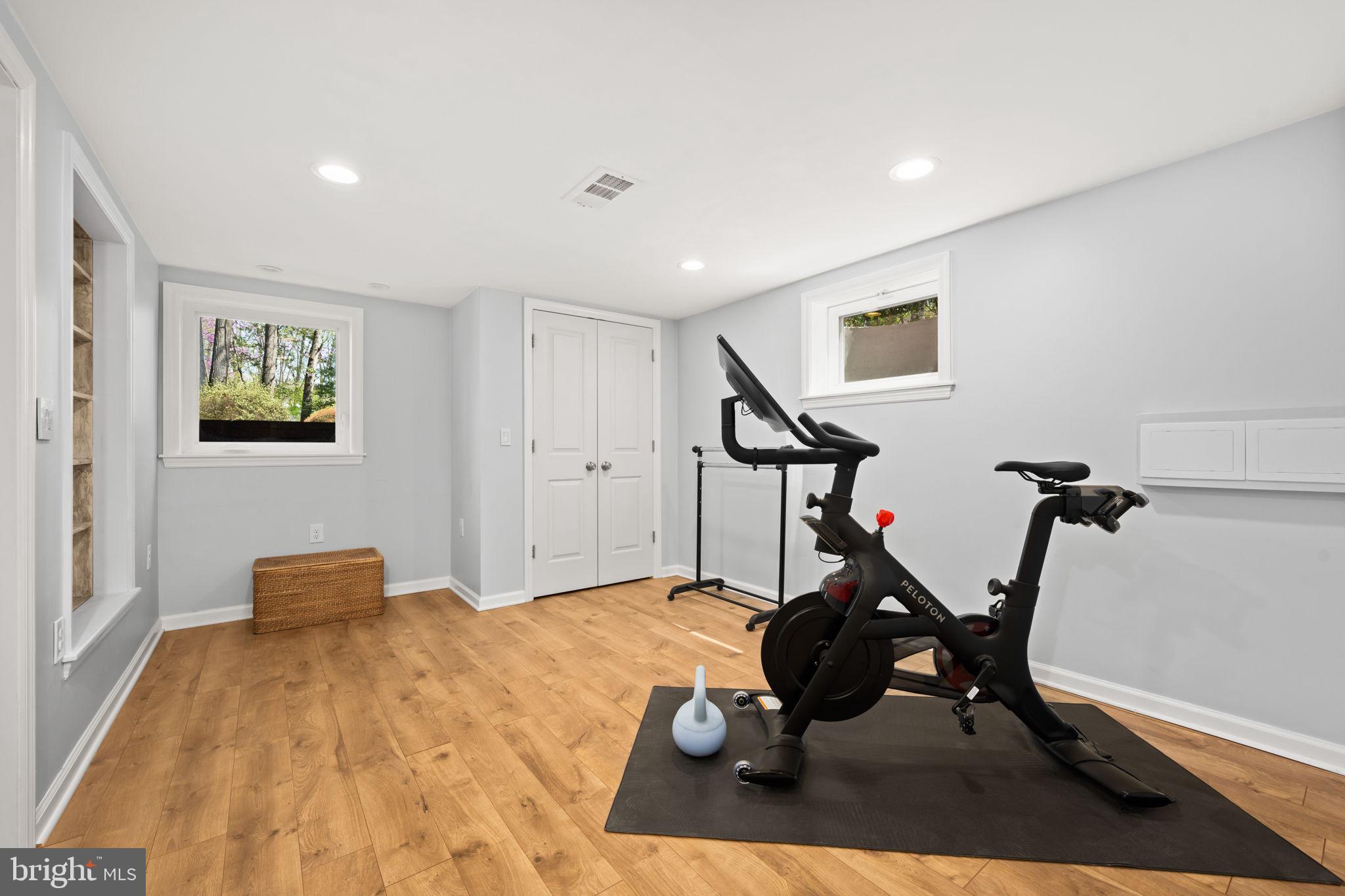 3814 Hillcrest Lane Annandale, VA 22003 - Photo 33 of 48 a room with gym equipment and a table