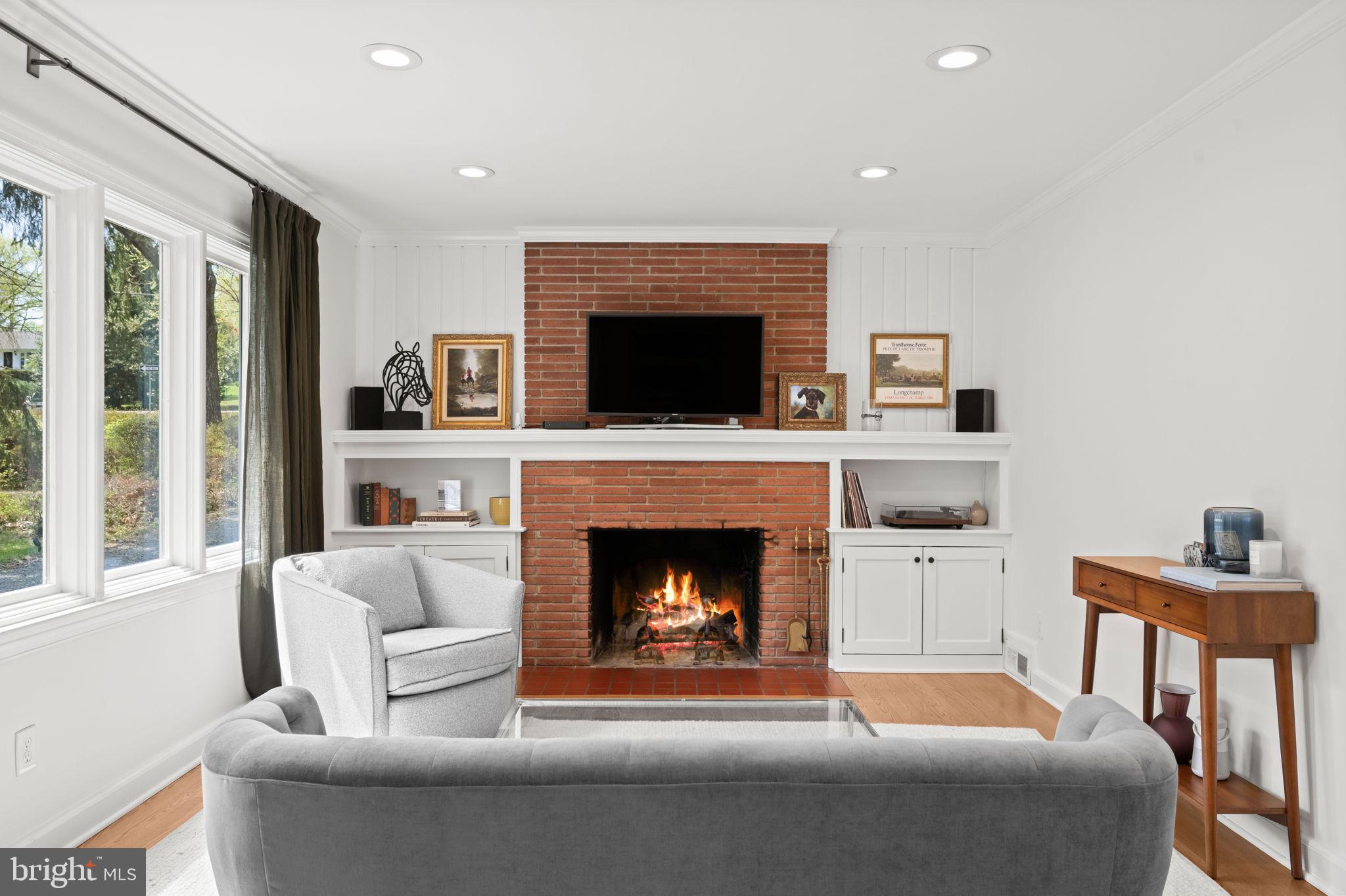 3814 Hillcrest Lane Annandale, VA 22003 - Photo 7 of 48 a living room with furniture and a fireplace
