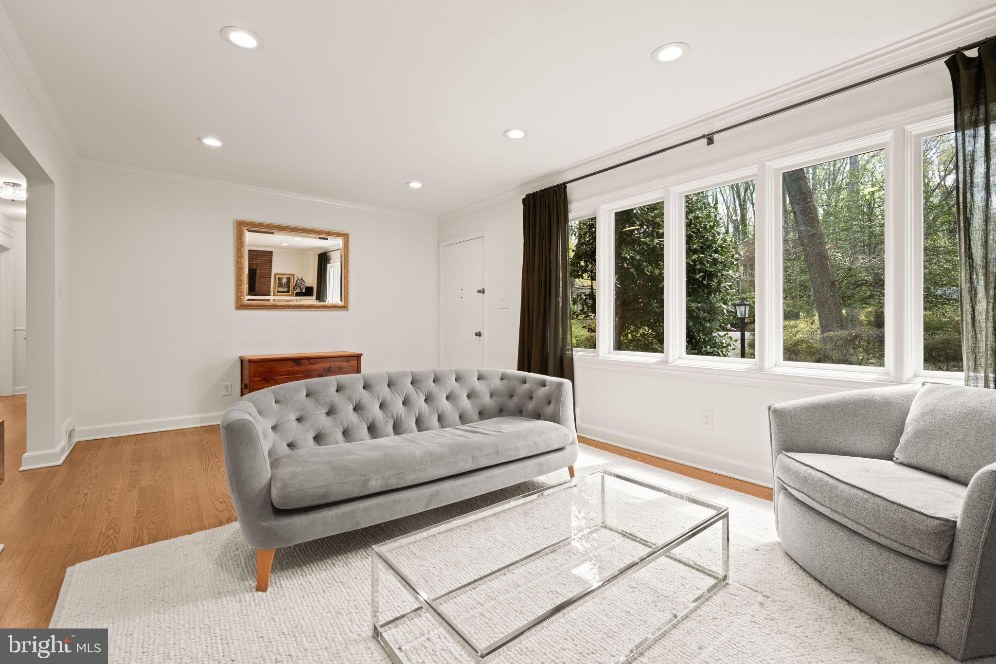 3814 Hillcrest Lane Annandale, VA 22003 - Photo 9 of 48 a living room with furniture and large windows