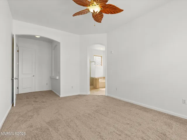 a living room with fireplace furniture and a flat screen tv