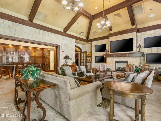 an aerial view of a house with a swimming pool