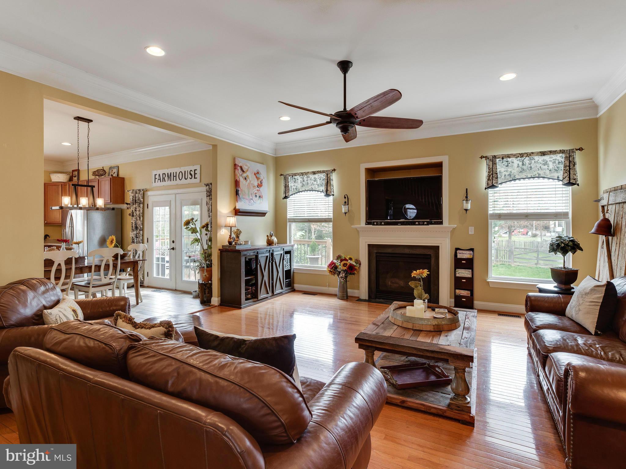 sunny open family room opens to kitchen
