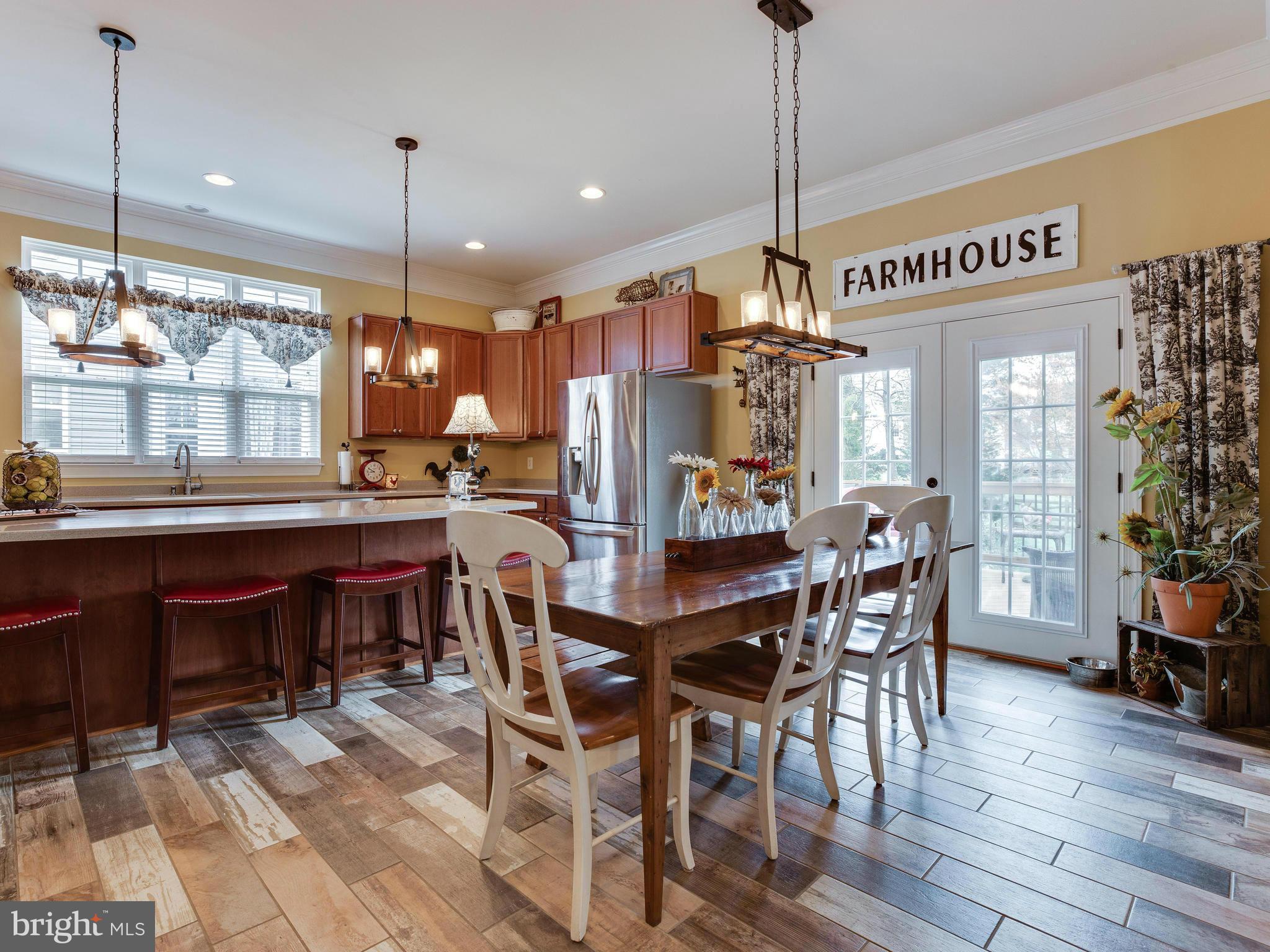 9037 Roaring Spring Loop Bristow, VA 20136 - Photo 9 of 30 Kitchen with vintage chic porcelain tile