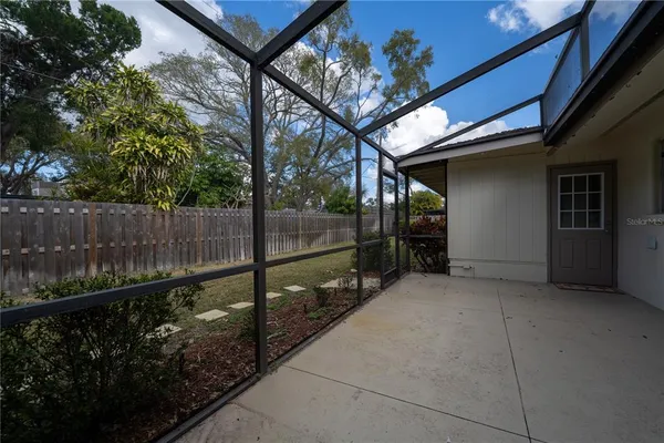 a view of backyard with green space