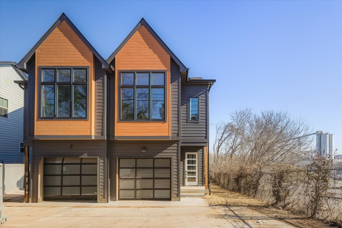 1902 3rd Avenue North, Unit B Nashville, TN 37208 - Photo 1 of 47 a view of a house with large windows
