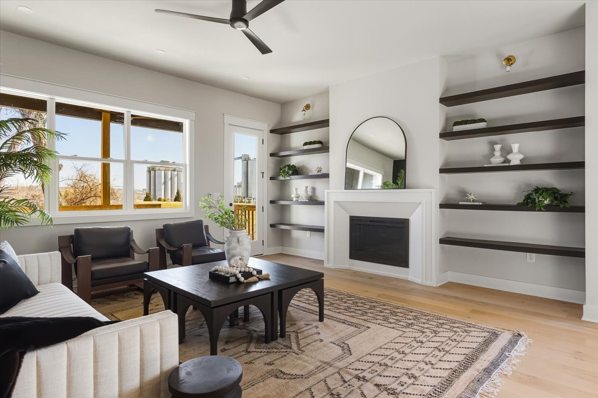 1902 3rd Avenue North, Unit B Nashville, TN 37208 - Photo 17 of 47 a living room with furniture a rug and a fireplace