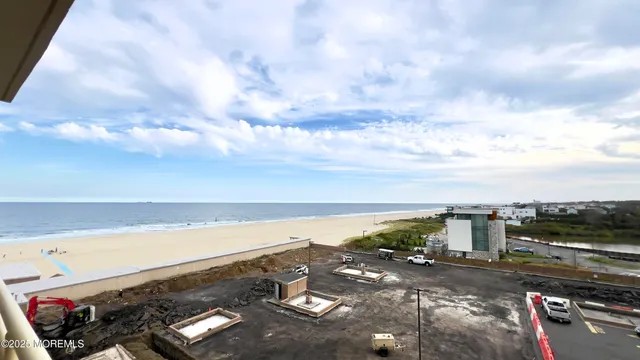 a view of a balcony with an outdoor seating