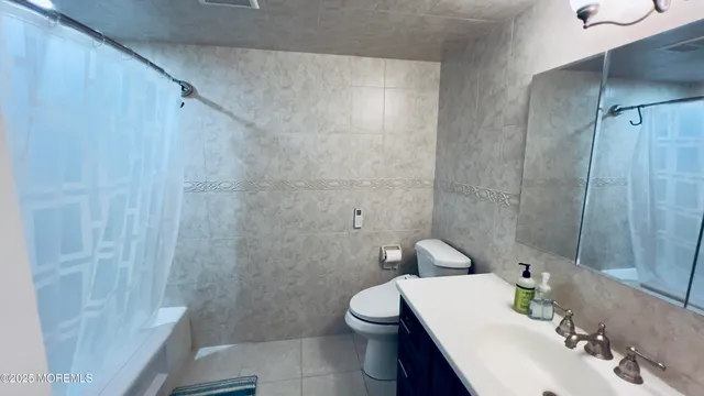 a kitchen with sink and stove top oven