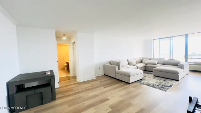 a view of a balcony with an outdoor seating