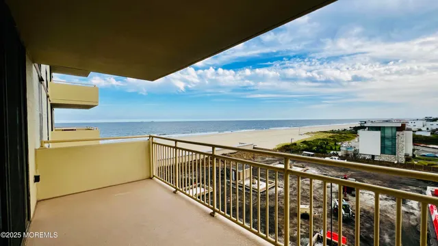 a kitchen with granite countertop a sink stove and cabinets