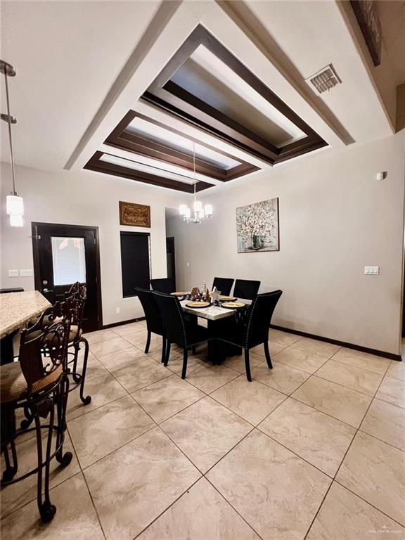 1313 Mountain Road Mission, TX 78573 - Photo 8 of 11 a view of a dining hall with furniture and a potted plant