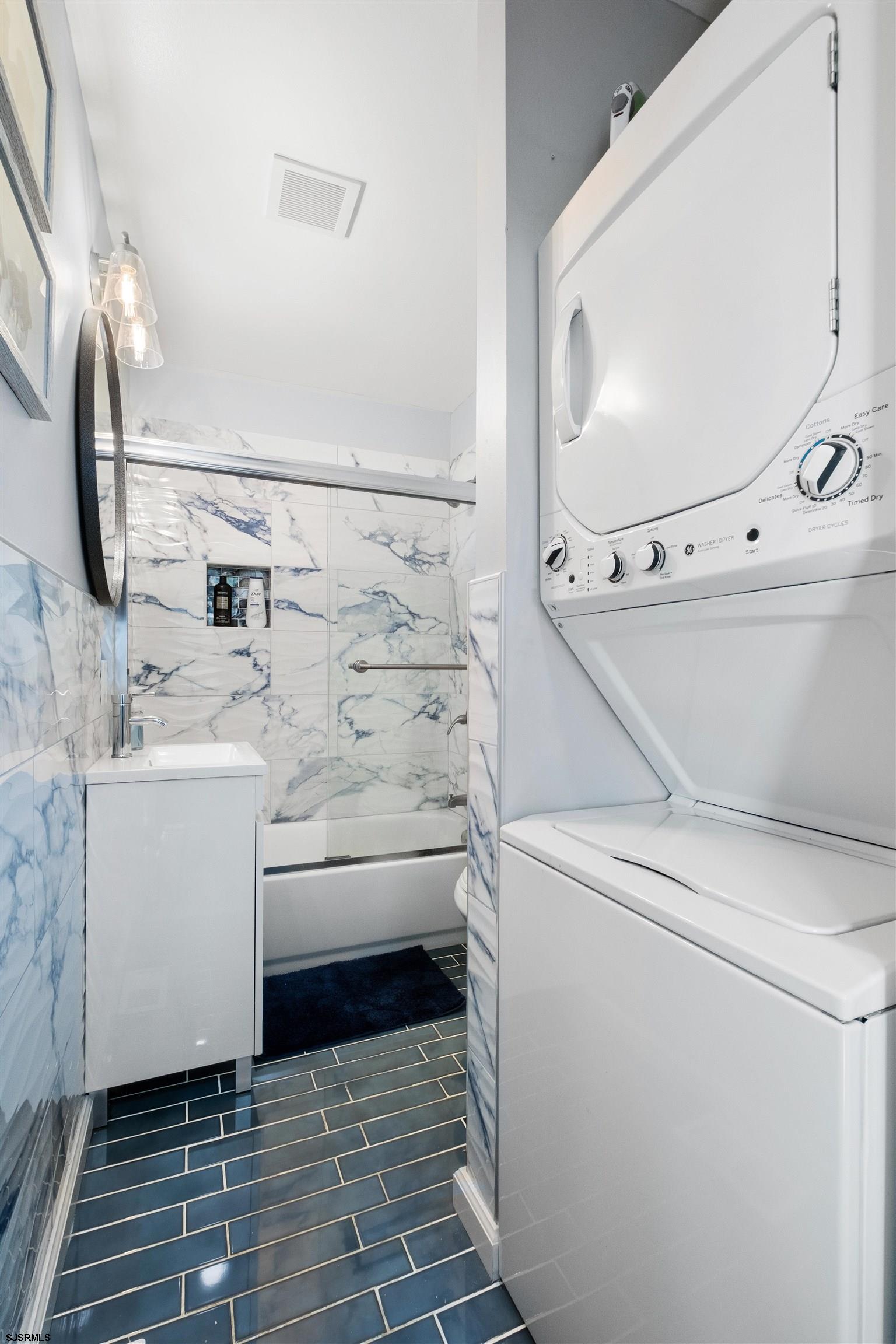 69 North Harrisburg Avenue, Unit 4 Atlantic City, NJ 08401 - Photo 25 of 25 a utility room with dryer and washer