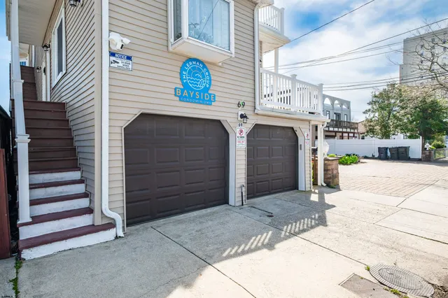 a front view of a house with a garage