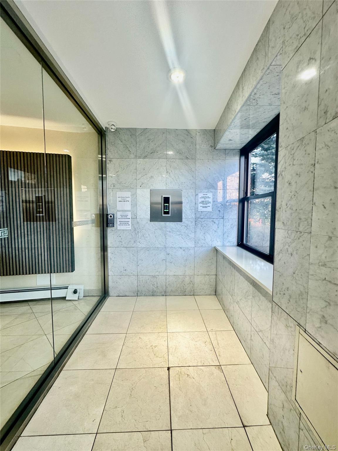 99-60 63rd Road, Unit 7Q Queens, NY 11374 - Photo 3 of 12 a view of an entryway of a house