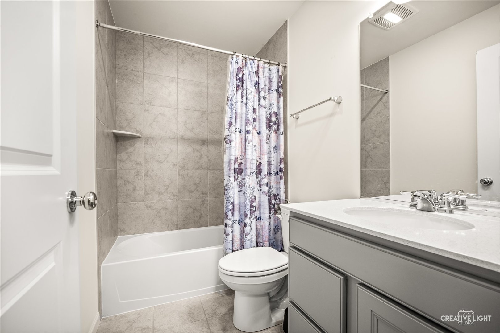 3667 Peregrine Way Elgin, IL 60124 - Photo 19 of 35 a bathroom with a sink a toilet and shower